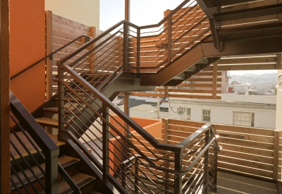 Stairs inside of Folsom-Dore Supportive Apartments in San Francisco, California.