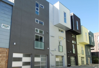View of the townhouses and garages at Blue Star Corner in Emeryville, Ca.