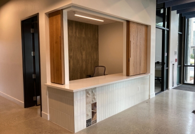 Lobby reception desk custom made by DBA Workshop inside Page Street Studios in San Jose, Ca