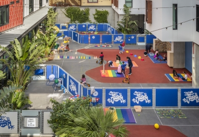 Outdoor child care center with children playing at La Fenix in San Francisco.