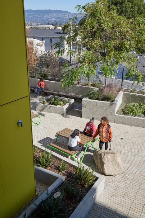 Looking out to the courtyard of Coliseum Place in Oakland, California.