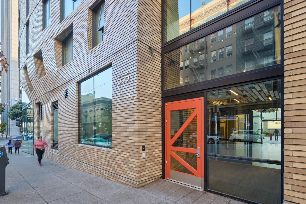 Exterior view of the entry to 555 Larkin in San Francisco.