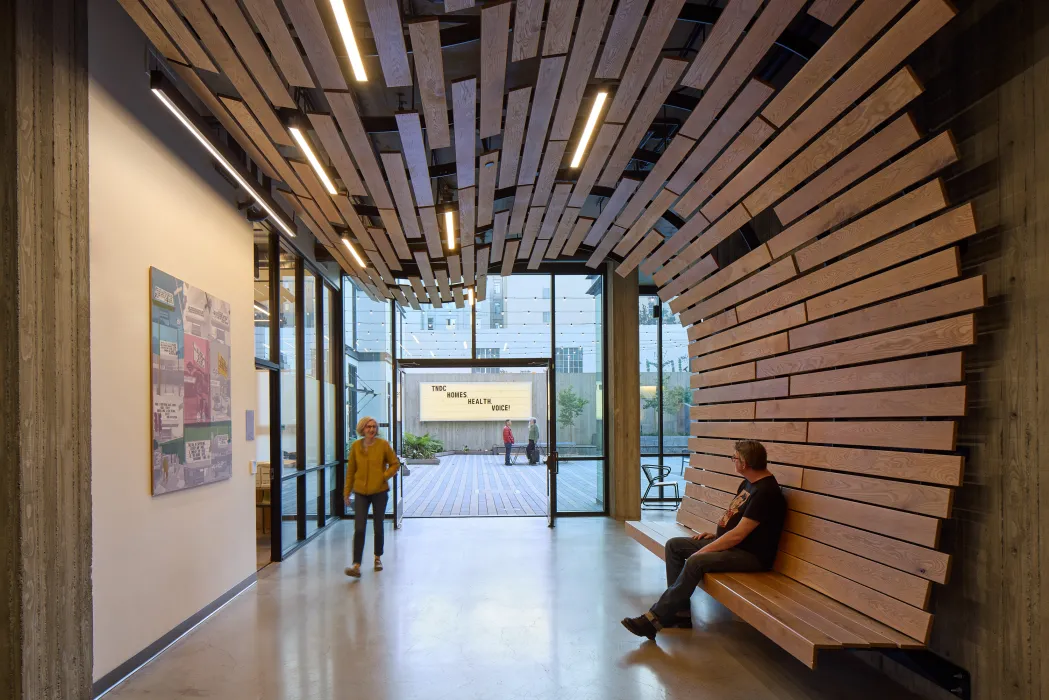 Interior of the entry lobby and custom bench at 555 Larkin in San Francisco.