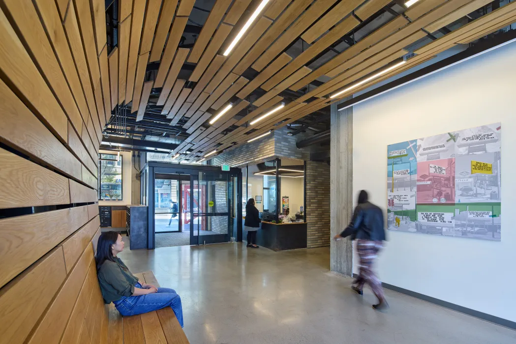 Interior of the entry lobby and custom bench at 555 Larkin in San Francisco.