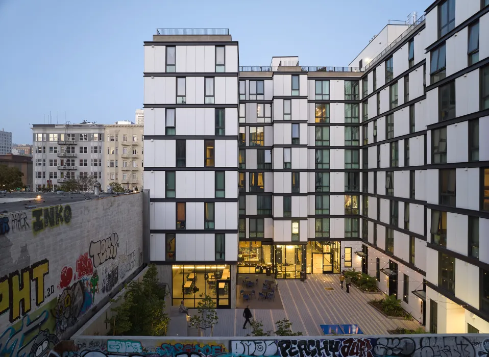 Birds eye view of the courtyard at 555 Larkin at dusk.