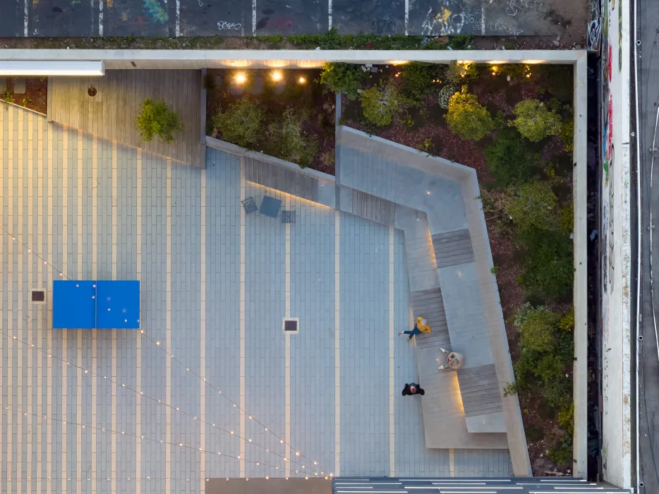 Aerial view of the courtyard at 555 Larkin at dusk.