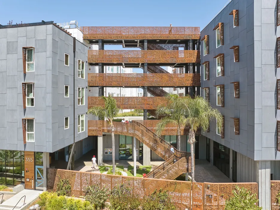 Aerial view looking at the entry courtyard and open-air stair at Sango Court.