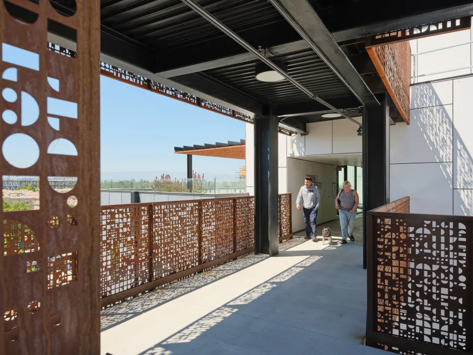 Walking through the open air bridges at Sango Court.