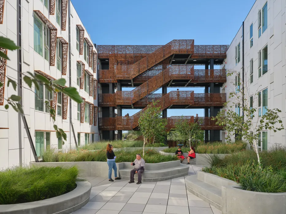 Courtyard behind the open-air stair and bridges at Sango Court.