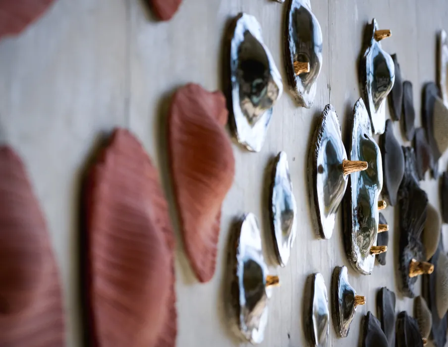 Ceramics hanging in the lobby of Isle House on Treasure Island in San Francisco..