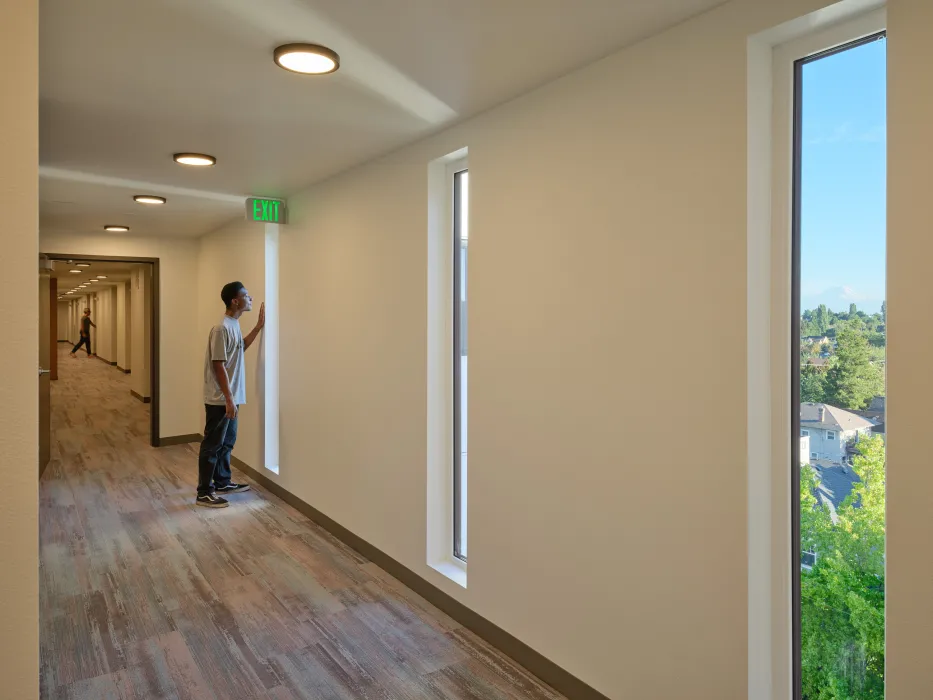 Residential hallway inside Africatown Plaza in Seattle.