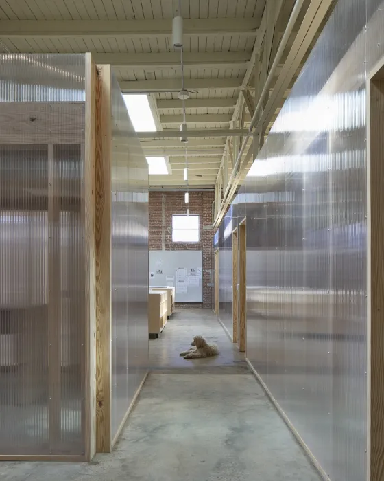 Hallway of the translucent double-walled polycarbonate panels private offices at Wyatt Builds office.