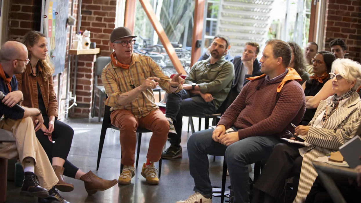 Group of people sitting at the DBA SF Office.