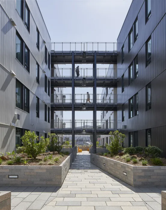 Exterior view of the courtyard and open-air hallways at Amani and Nia at Sunnydale.